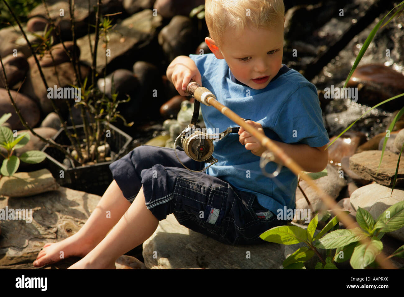 Little boy fishing Stock Photo Alamy