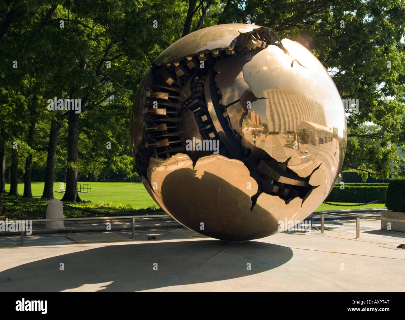 The gold 'Sphere within a Sphere' by Arnaldo Pomodoro in the grounds of