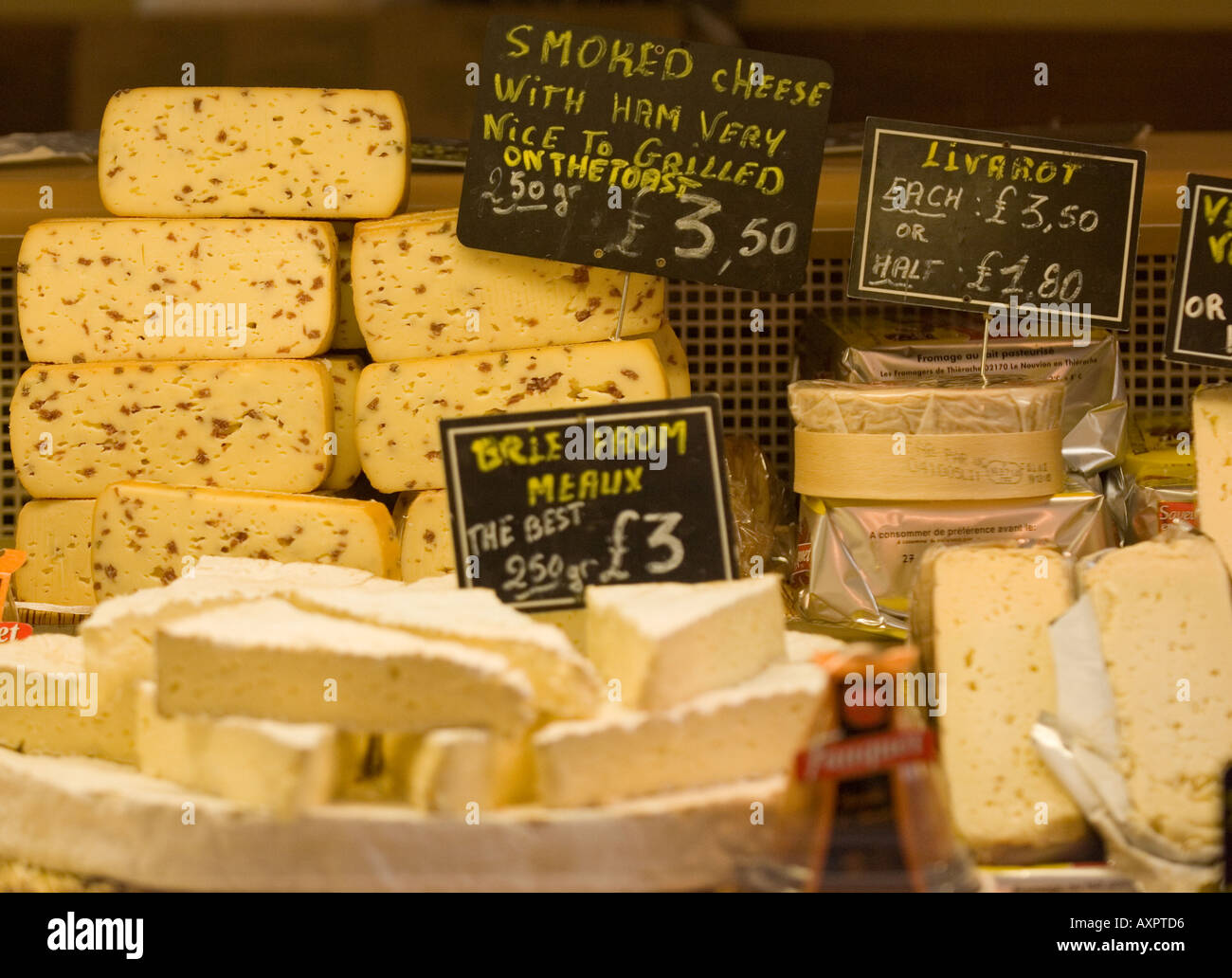 French cheeses on display at british market Stock Photo Alamy