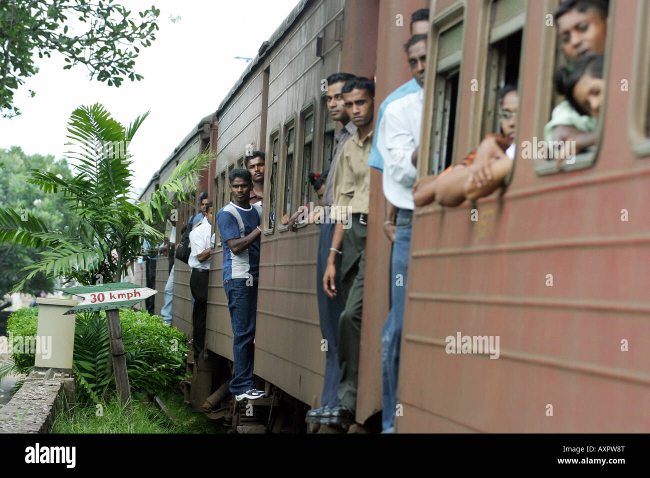Sri Lanka train - A crowded train on the Colombo to Galle railway line, Sri lanka, Asia Stock Photo