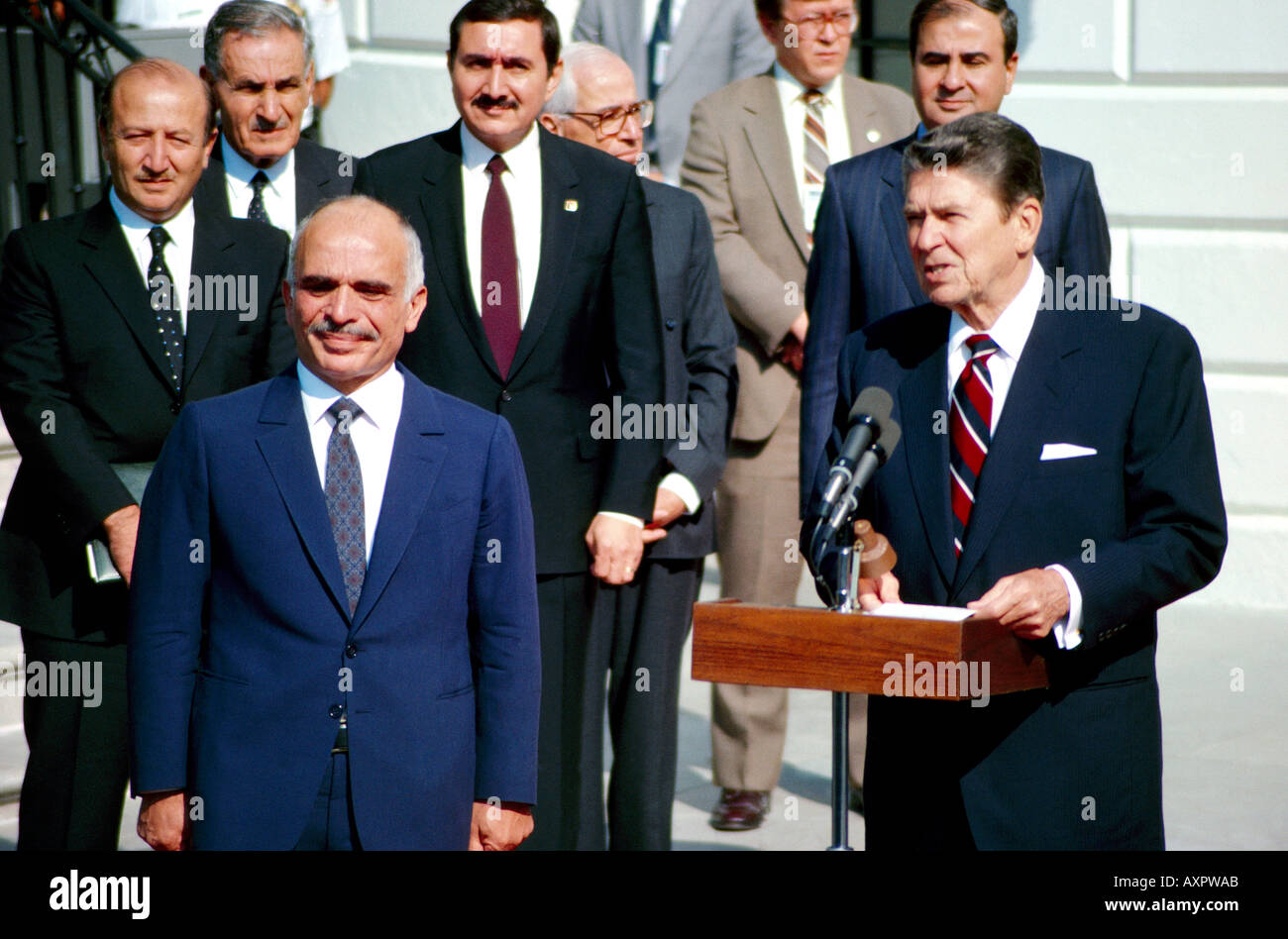 US President Ronald Reagan meeting with King Hussein of Jordan outside the the White House 21 December 1982 Washington DC USA Stock Photo