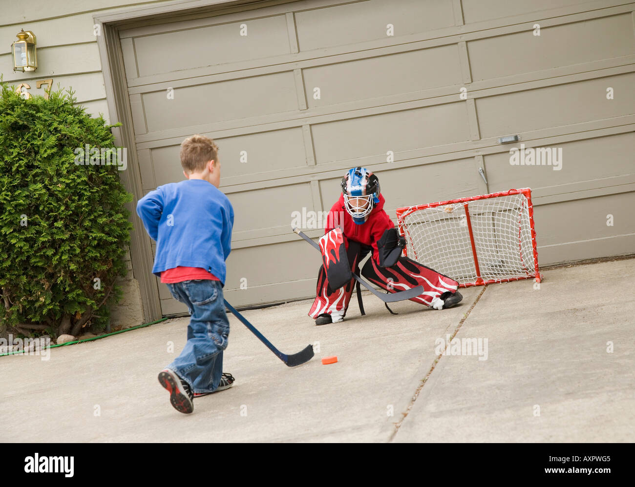 Street hockey kid hires stock photography and images Alamy