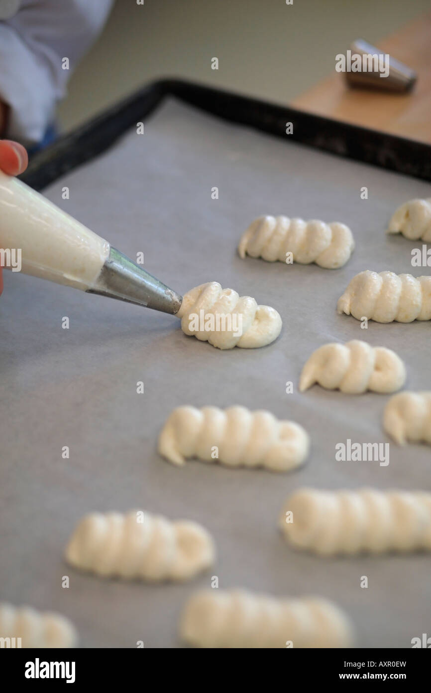 Pastry chef making pastry decoration Stock Photo - Alamy
