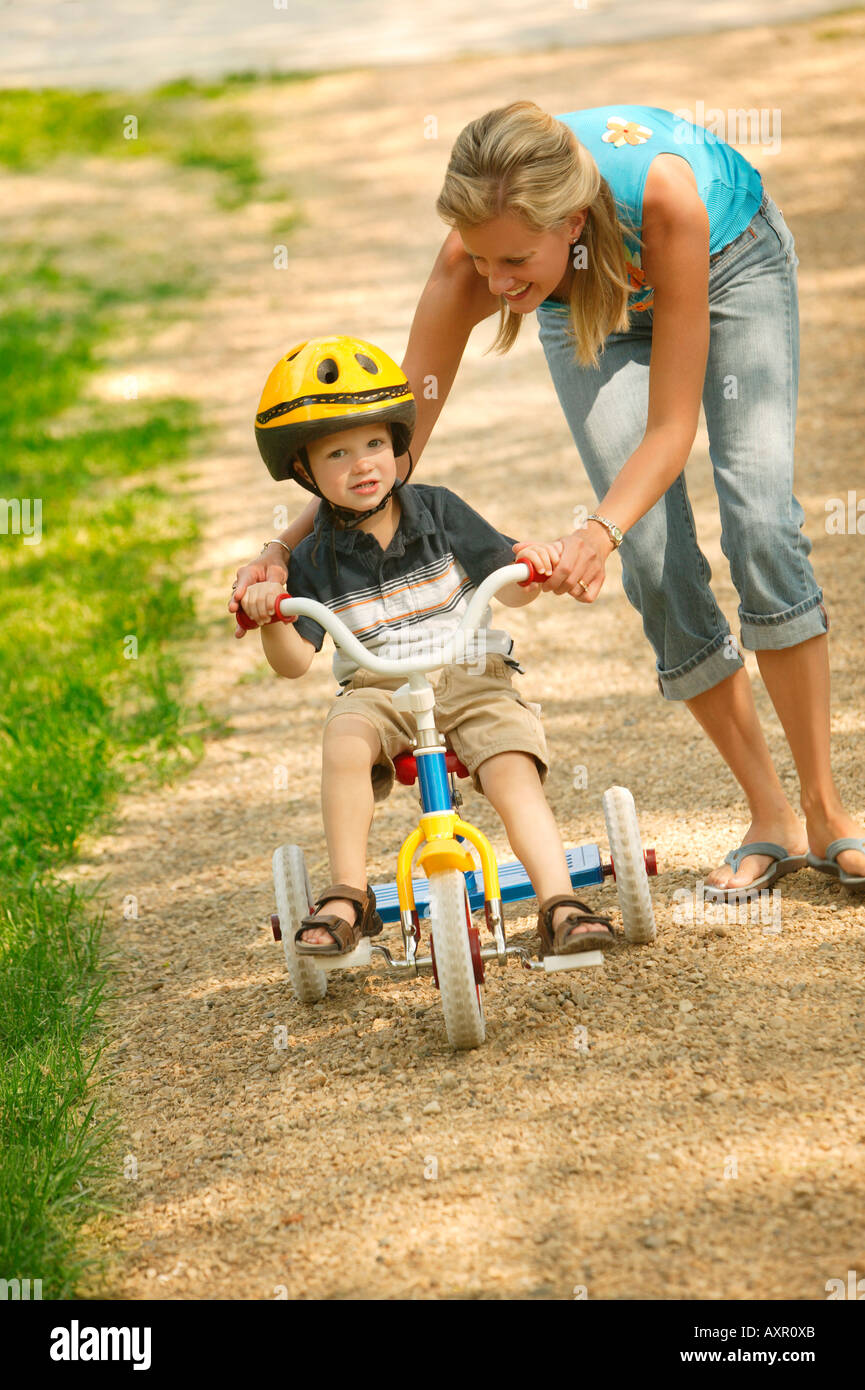 how to teach a child to ride a tricycle