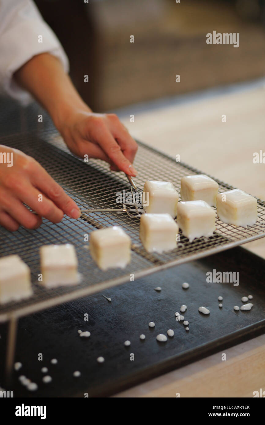 Pastry chef making small pastries Stock Photo - Alamy