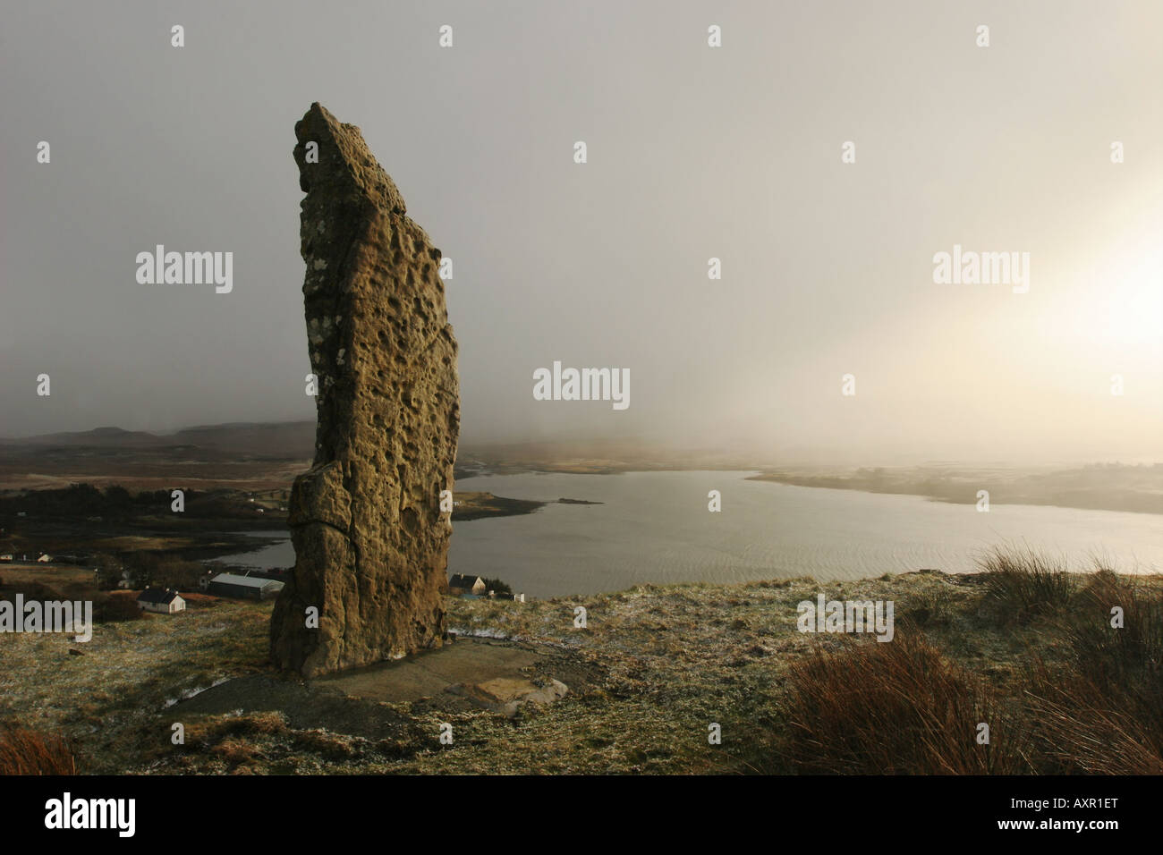 The Duirnish Stone Above the Village of Dunvegan in a Clearing Snow Shower Isle of Skye Scotland Stock Photo