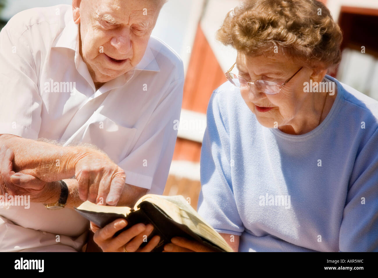Couple study Bible together Stock Photo