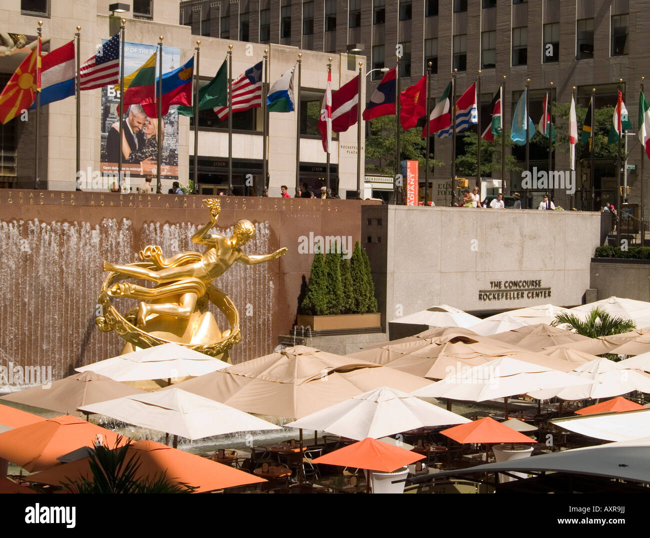 Covered tables and a gilded statue of Prometheus at the Rockefeller Centre, New York City USA Stock Photo