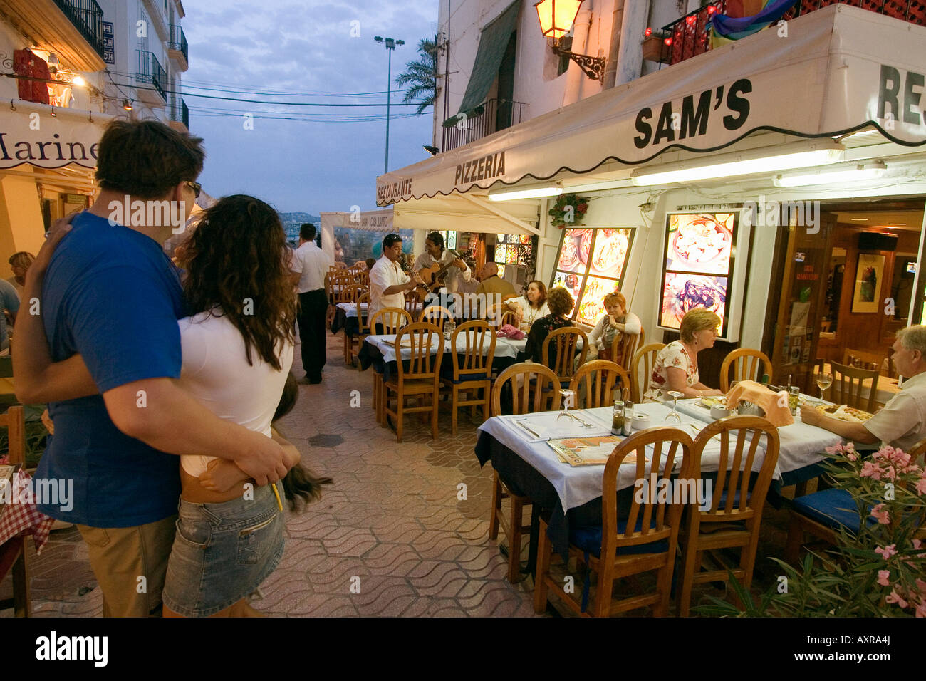 Spain Baleares island Ibiza town by night restaurants near harbour Sa Penya Stock Photo