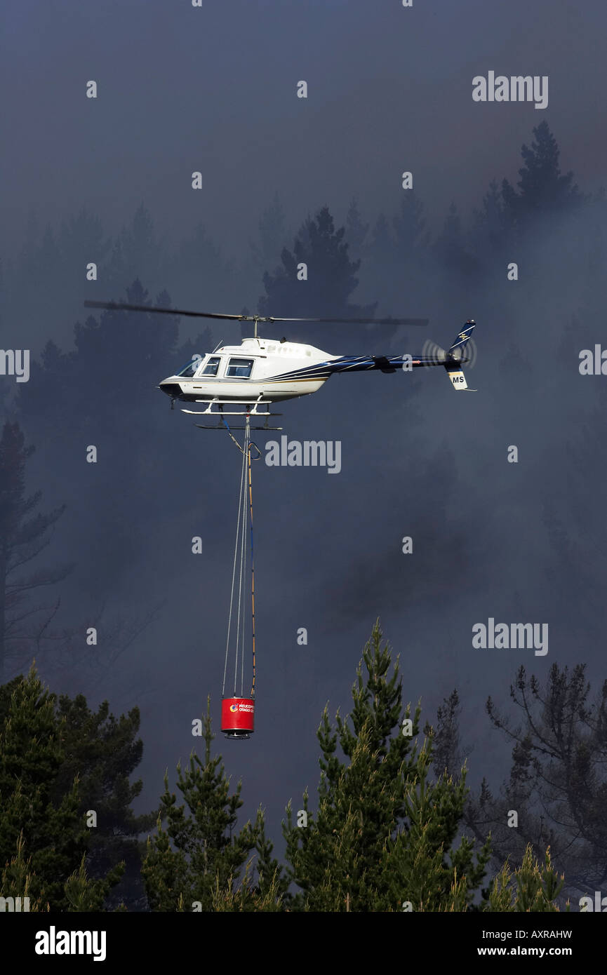 Helicopter Fighting Forest Fire Dunedin South Island New Zealand Stock Photo