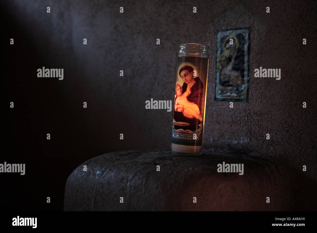 VOTIVE CANDLE WITH A PICTURE OF SAINT ANTHONY IN AN OLD CHAPEL IN NEW MEXICO USA Stock Photo Alamy