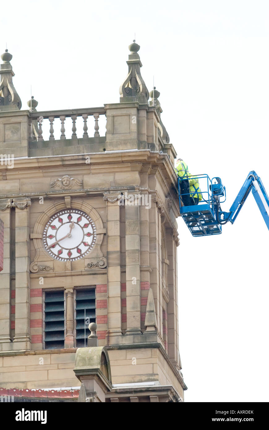 Cleaning the town hall clock tower Stock Photo Alamy