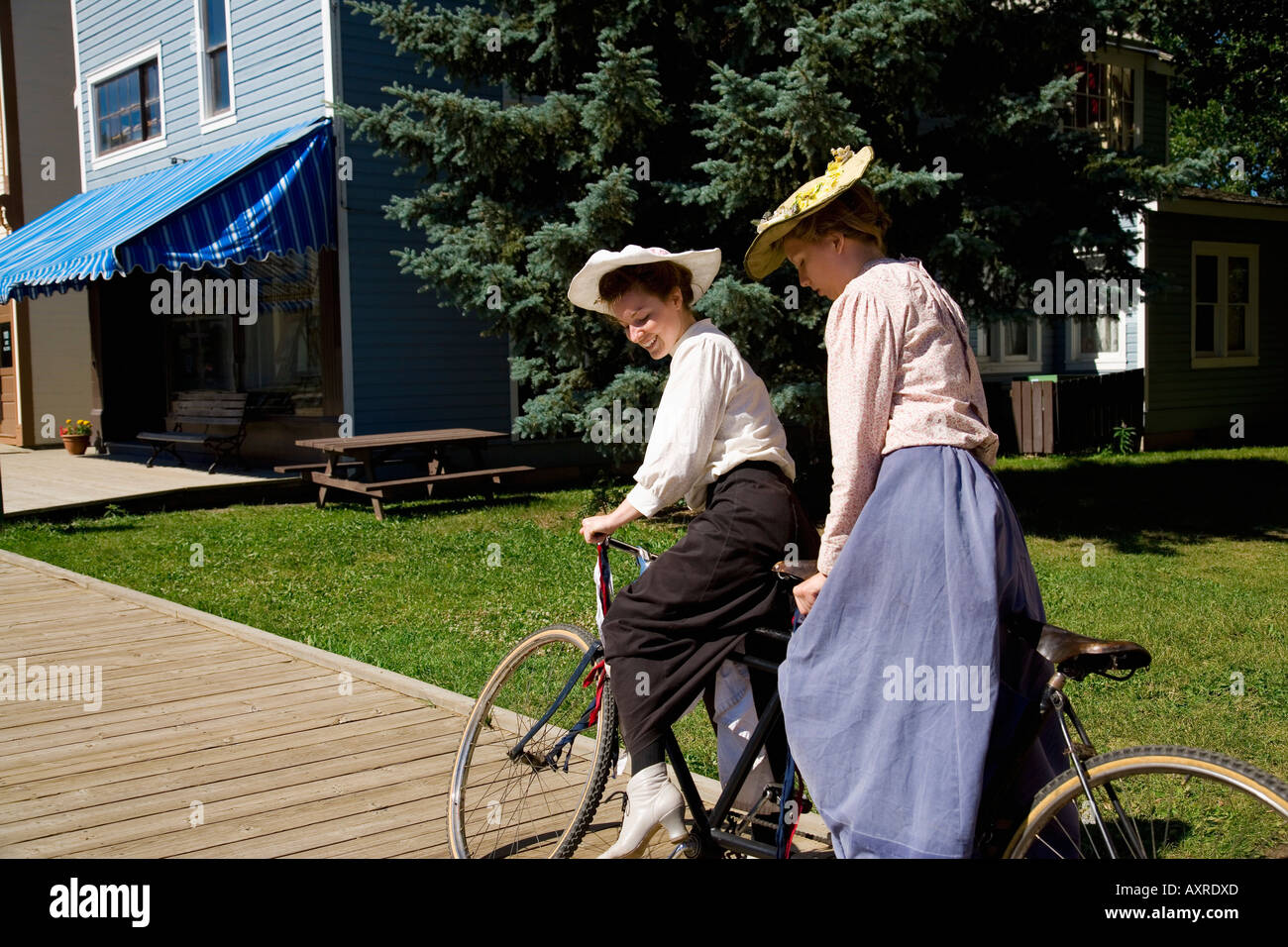 Women riding a tandem bicycle Stock Photo Alamy