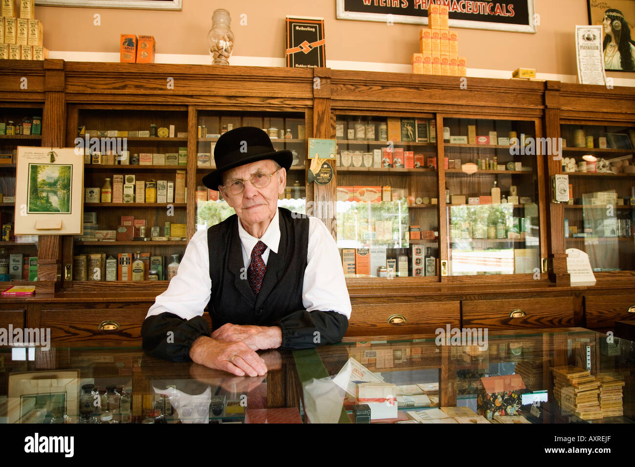 Man in an old fashioned pharmacy Stock Photo