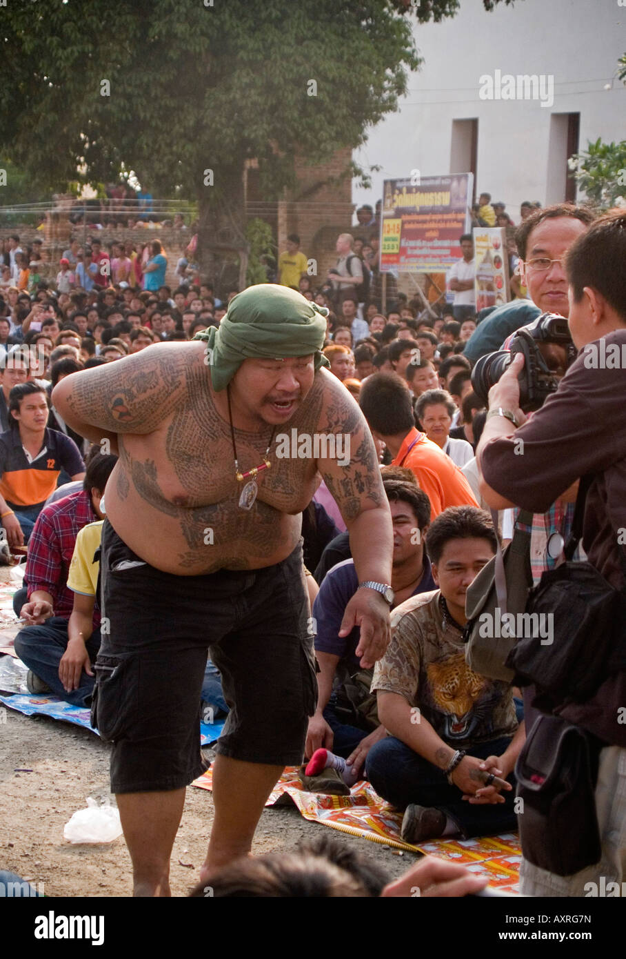 fat man in a trance at the Tattoo Festival in Bangkok Stock Photo