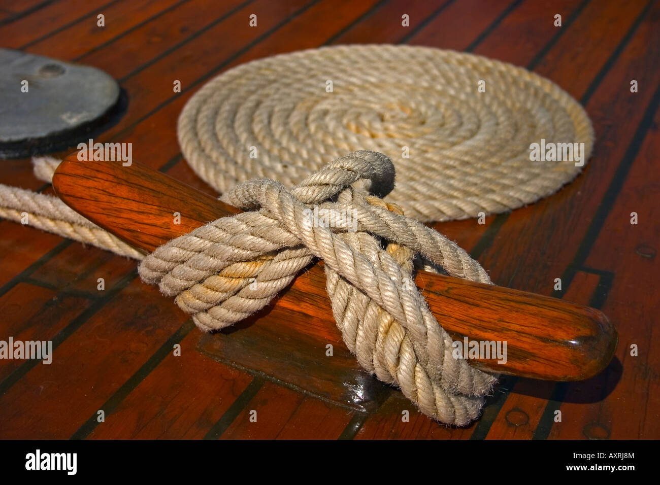 A coiled rope onboard a tall ship Stock Photo - Alamy