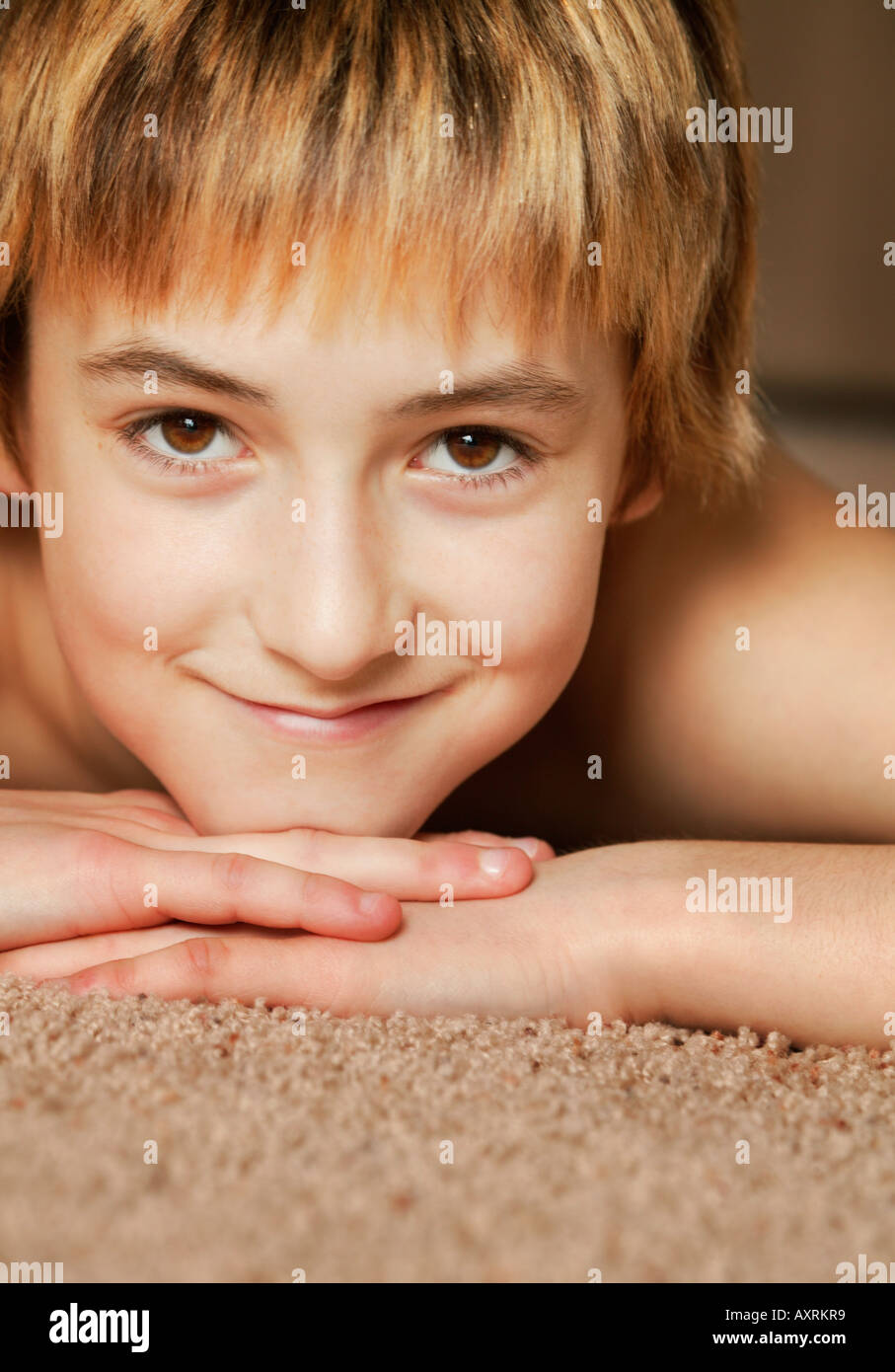 Boy laying down Stock Photo Alamy