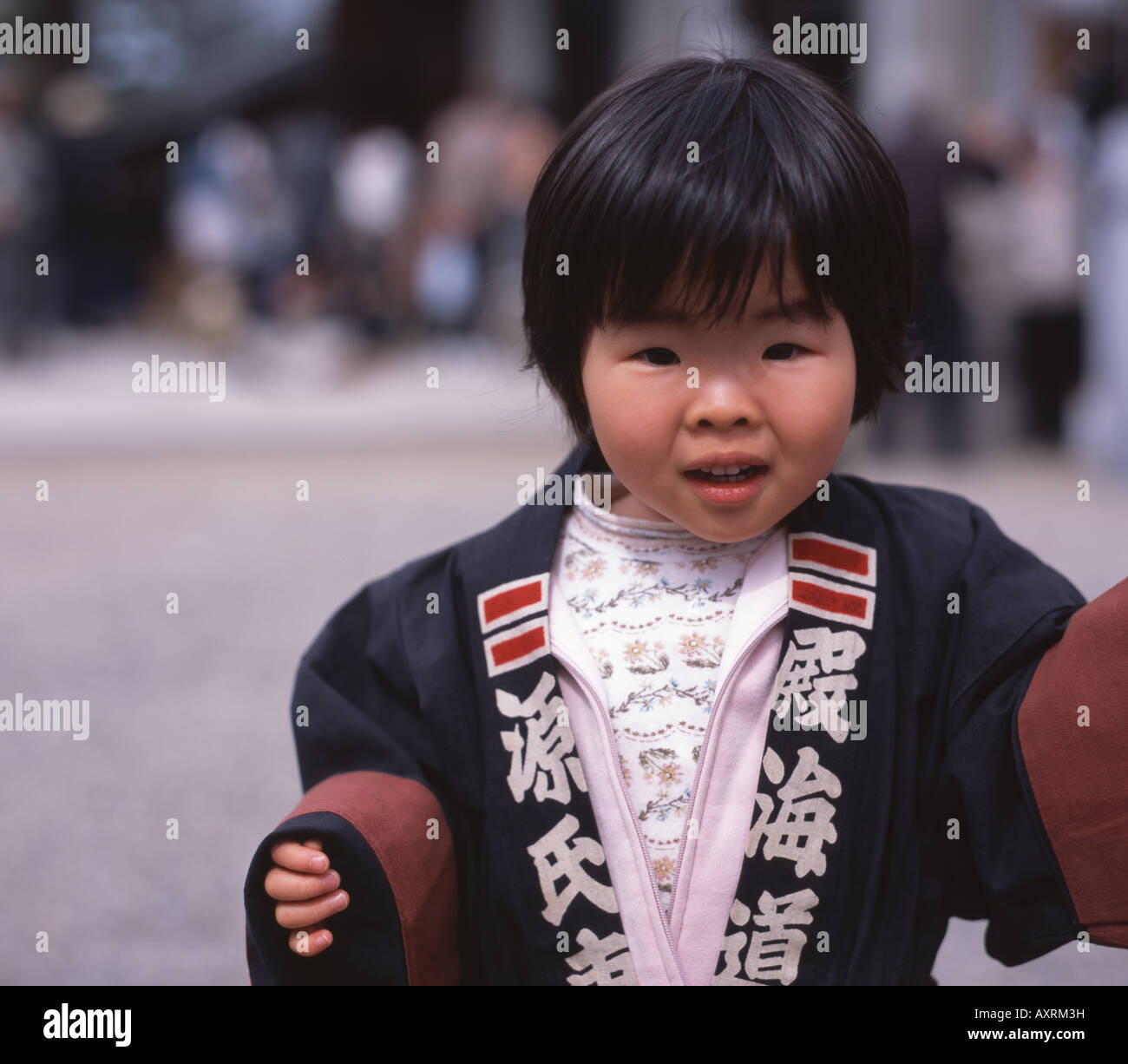 Young Japanese girl wearing happi coat at Okkawa festival Stock Photo