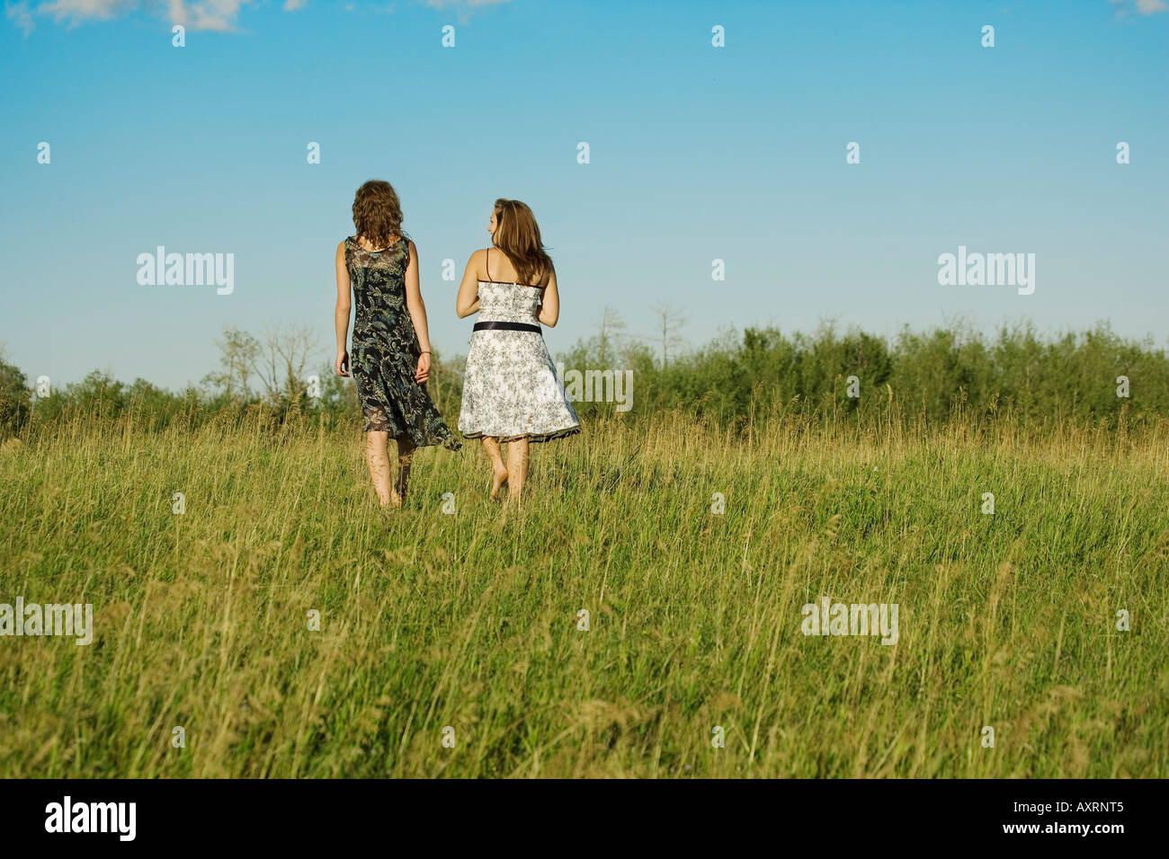 Two ladies talking walking in hi-res stock photography and images - Alamy