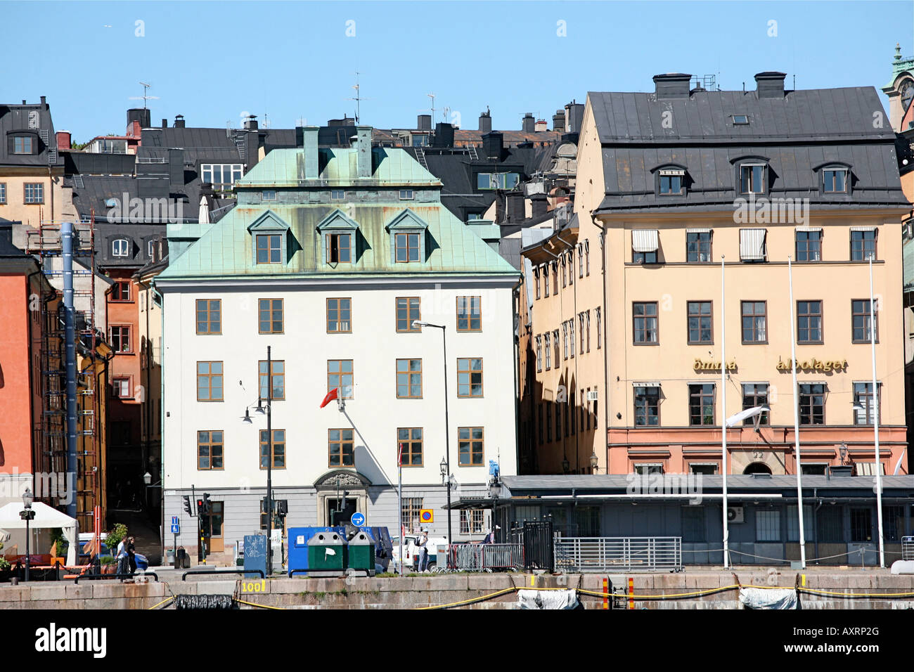 Buildings in assorted colors line the shore Stock Photo - Alamy