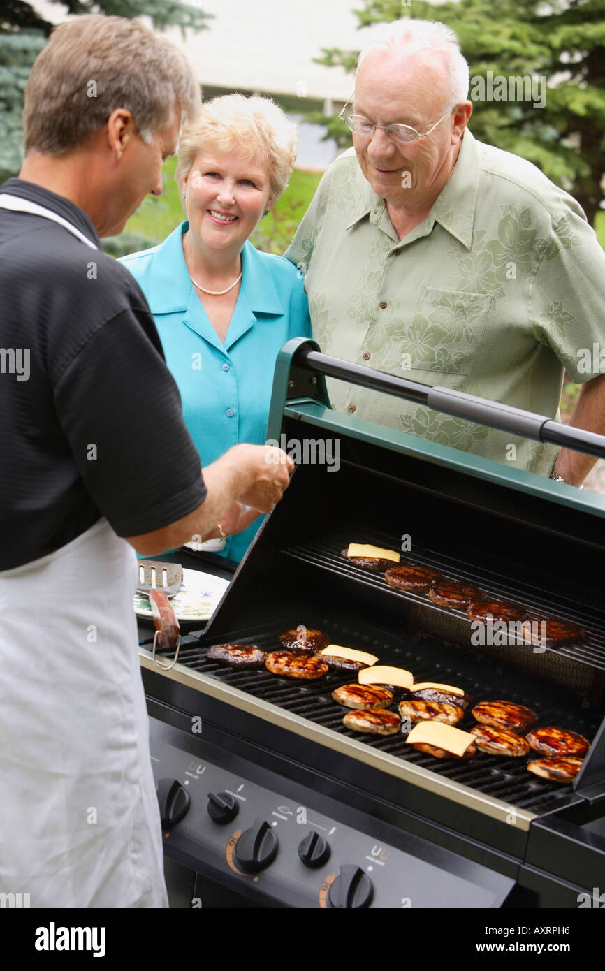 People at a BBQ Stock Photo