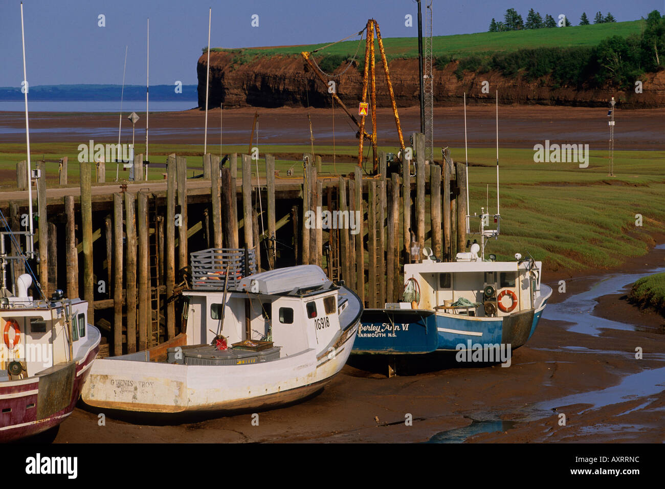 Fishing boats at low tide near Blomidon, New Minas Basin, Nova Scotia