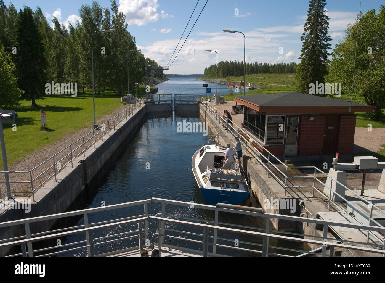 Boat at Neituri canal lock waiting for access to Lake Keitele Finland Stock Photo