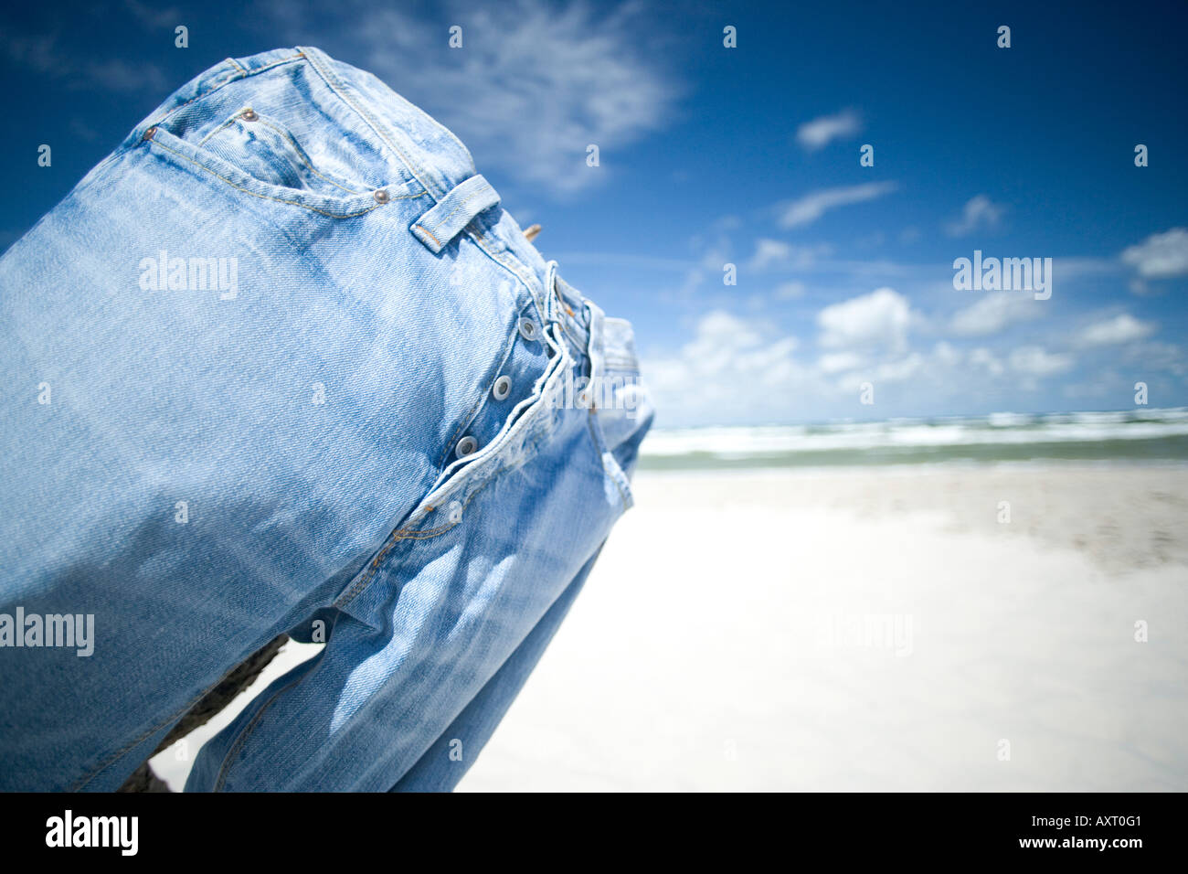 jeans on beach Stock Photo Alamy