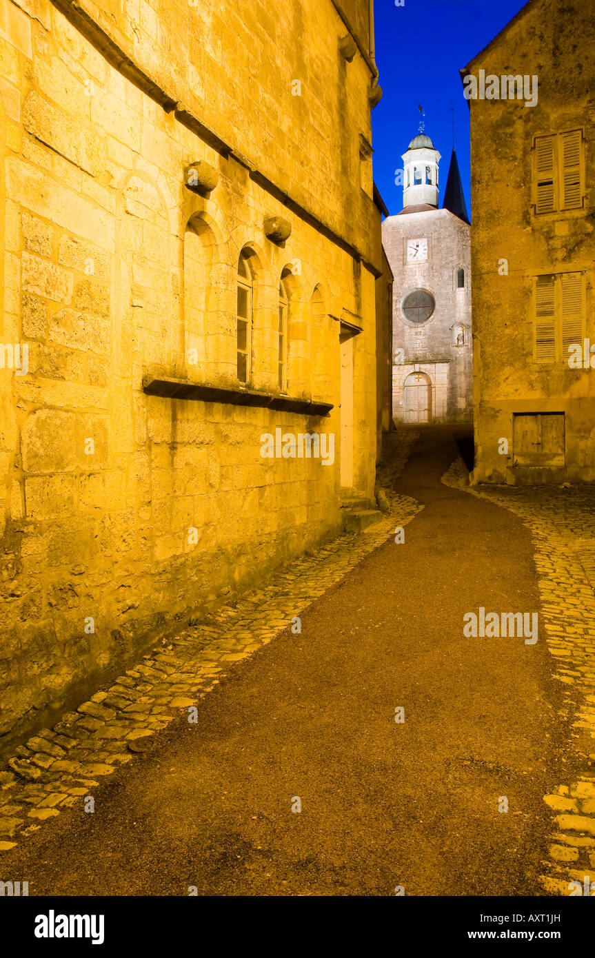 One of the streets of the french village Flavigny-sur-Ozerain, where the film 'Chocolat' was shot, at dusk Stock Photo