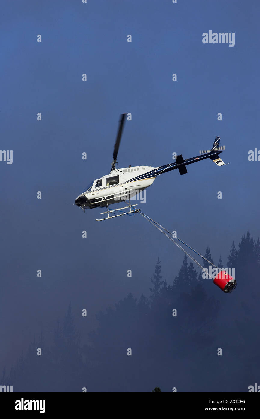 Helicopter Fighting Forest Fire Dunedin South Island New Zealand Stock Photo