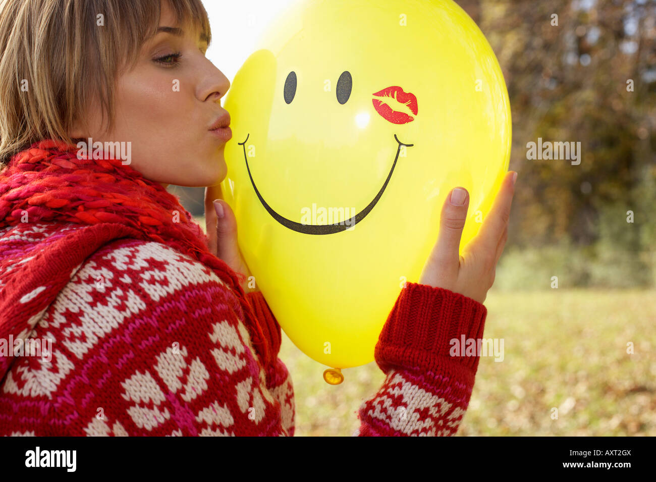 Woman Kissing Balloon High Resolution Stock Photography and Images Alamy