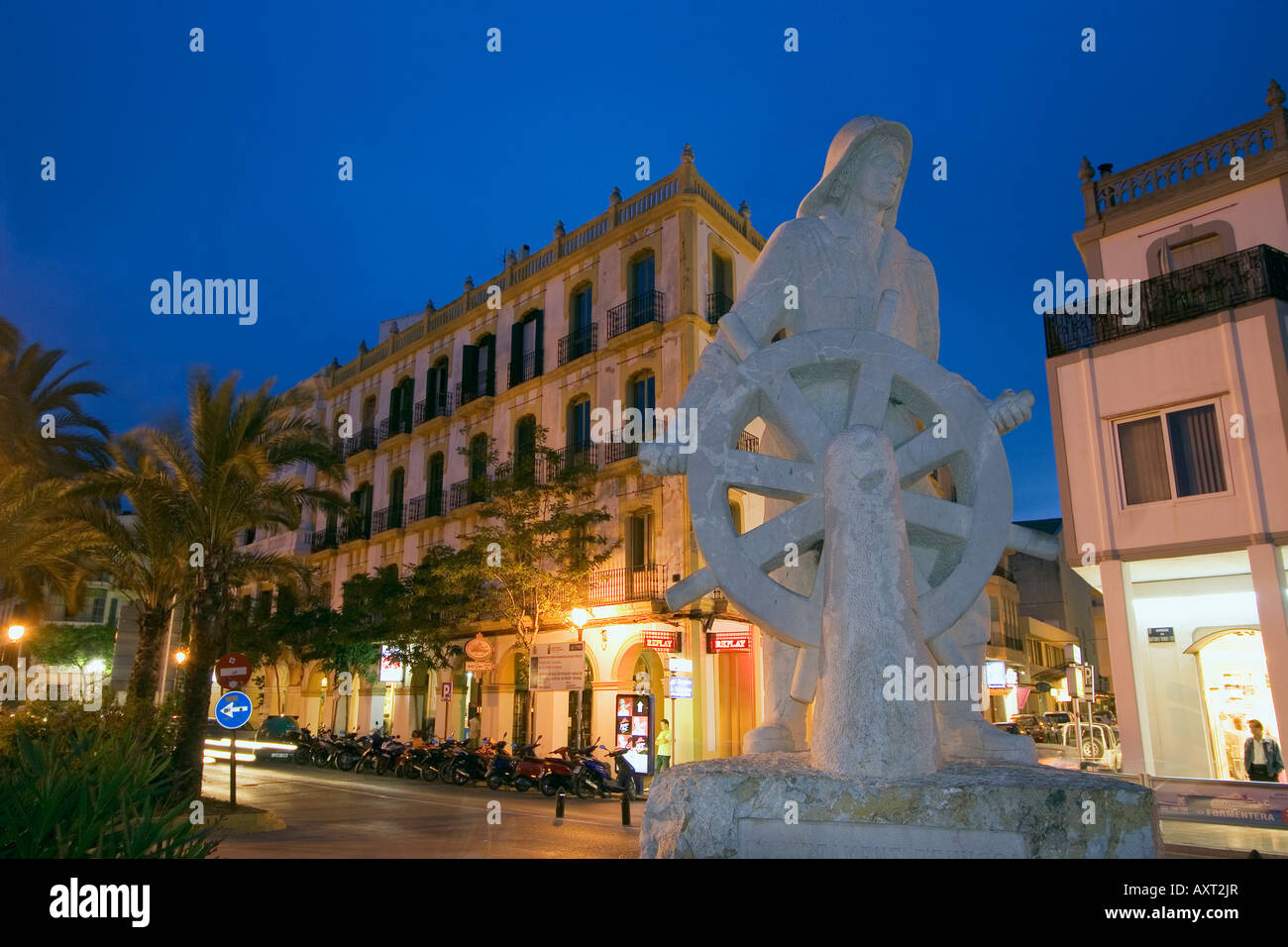 Spain Baleares island Ibiza town by night sculpture memorial to the sailor Hotel Montesol Stock Photo