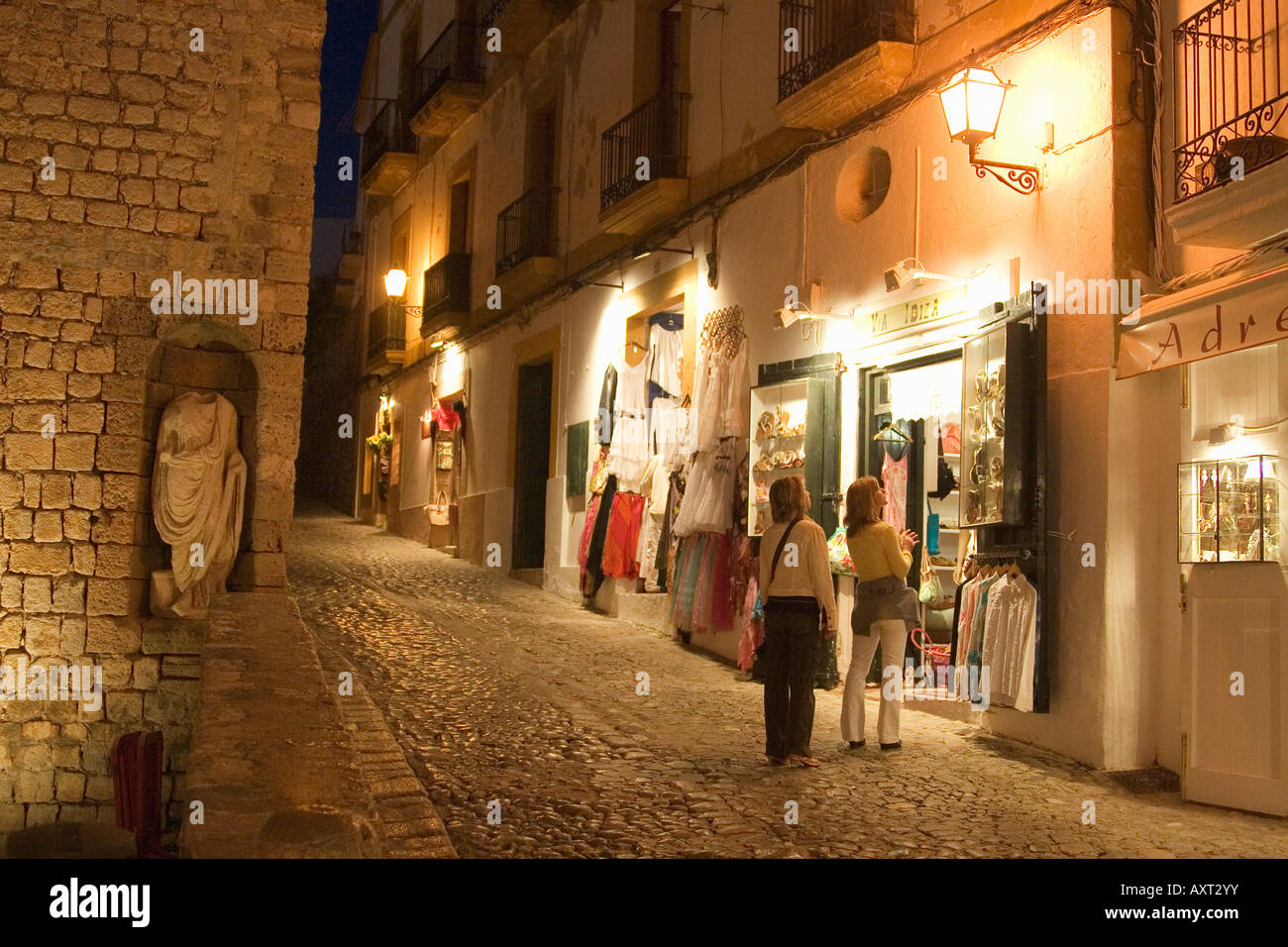 Spain Baleares island Ibiza town fashion shop in Dalt vila at night Stock Photo