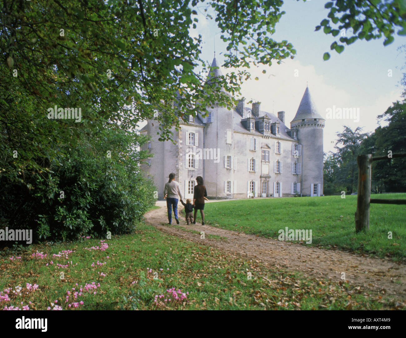 Strolling along park pathways at Chateau (Château) Nexon in France Stock Photo
