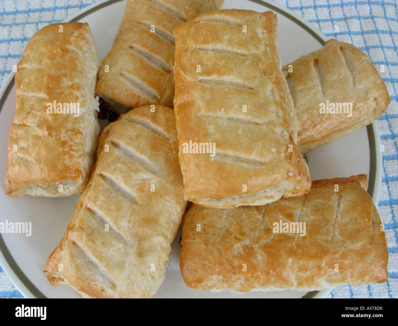 plate of sausage rolls unhealthy eating Stock Photo Alamy