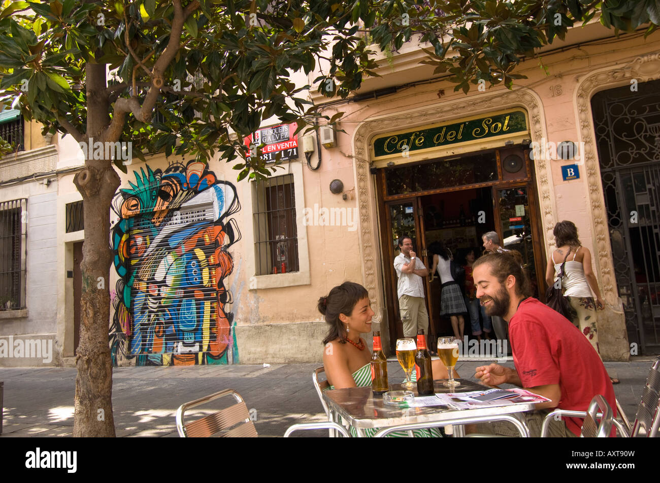 People enjoy beer at bar on Placa del Sol Gracia Barcelona Catalunya ...
