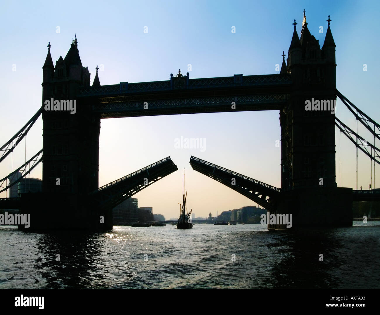 Tower Bridge London open raised for yacht Stock Photo