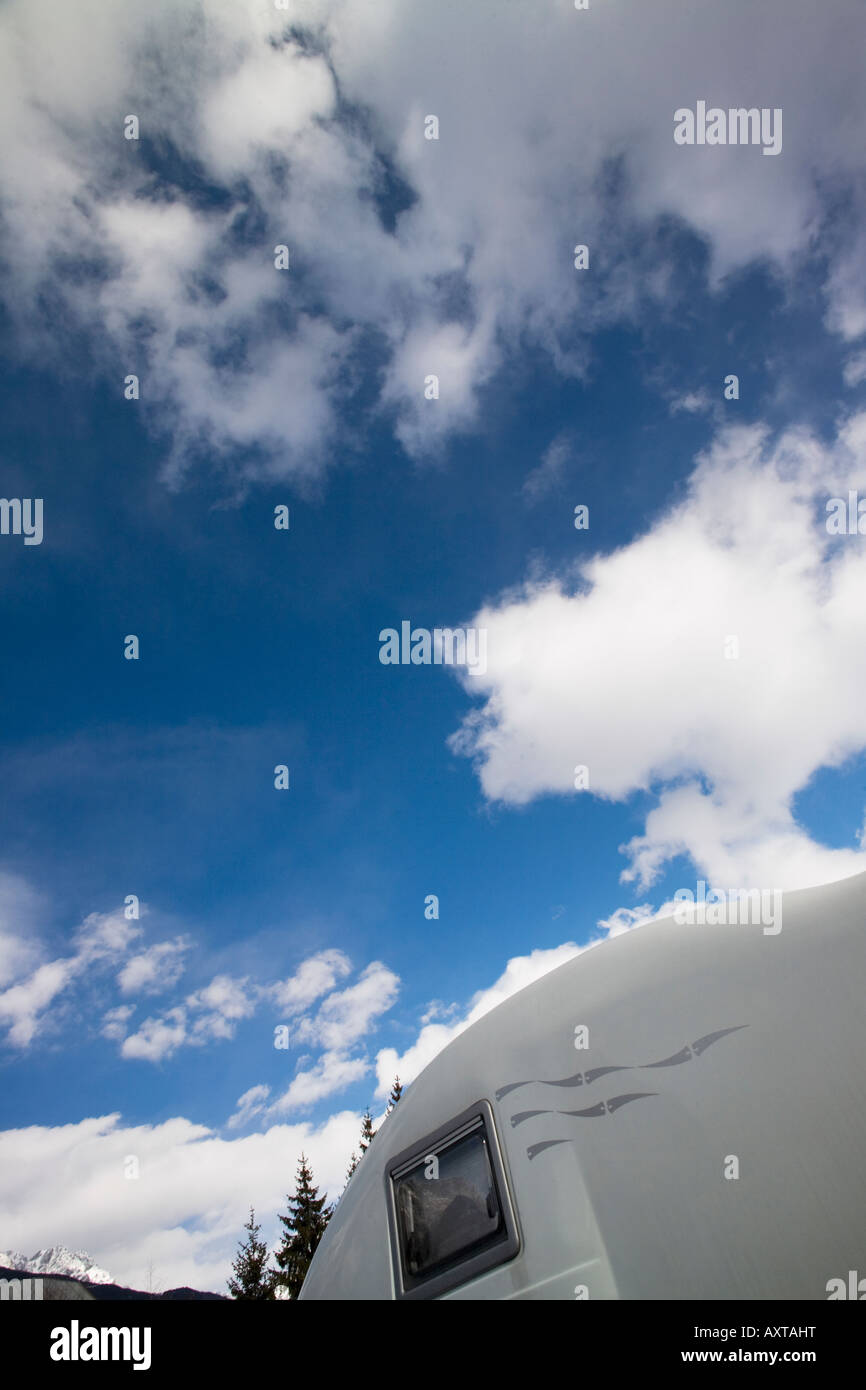 Campervan top and blue sky with clouds Stock Photo - Alamy