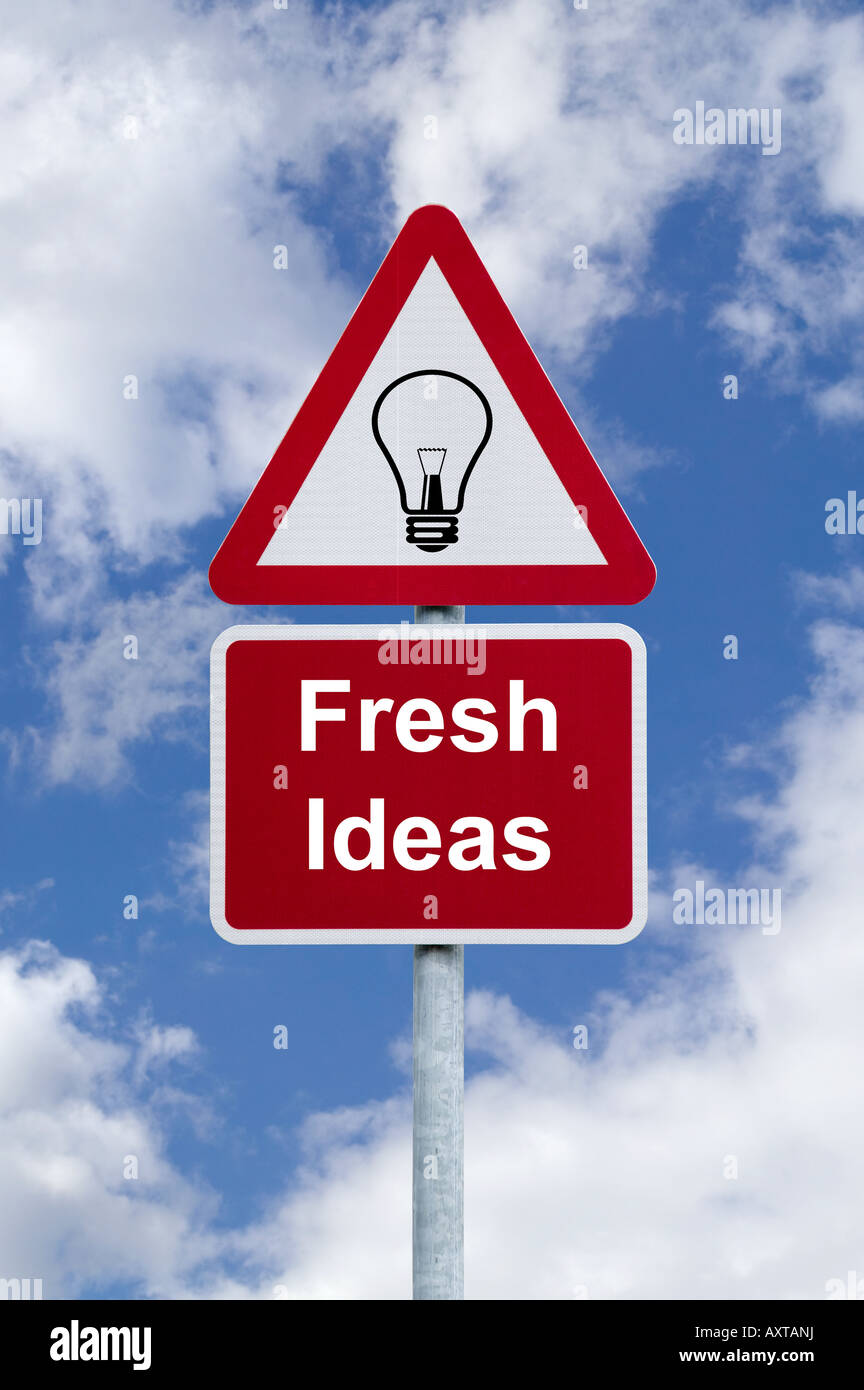 Signpost for Fresh Ideas against a blue cloudy sky business concept image Stock Photo