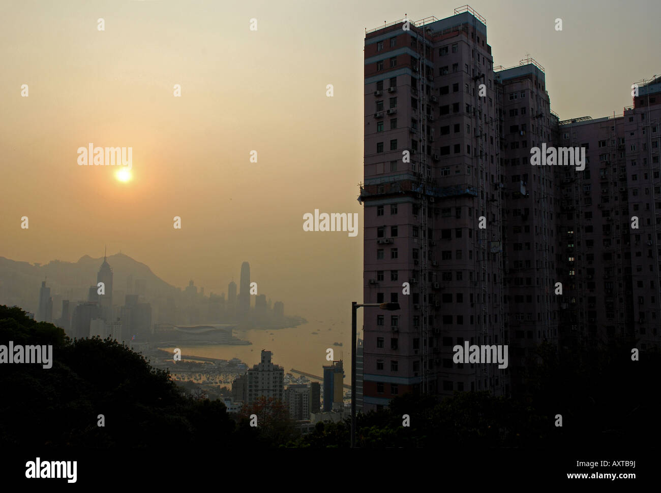 Tower block with view of Hong Kong in the background, taken from Bramer Hill. Asia. Stock Photo