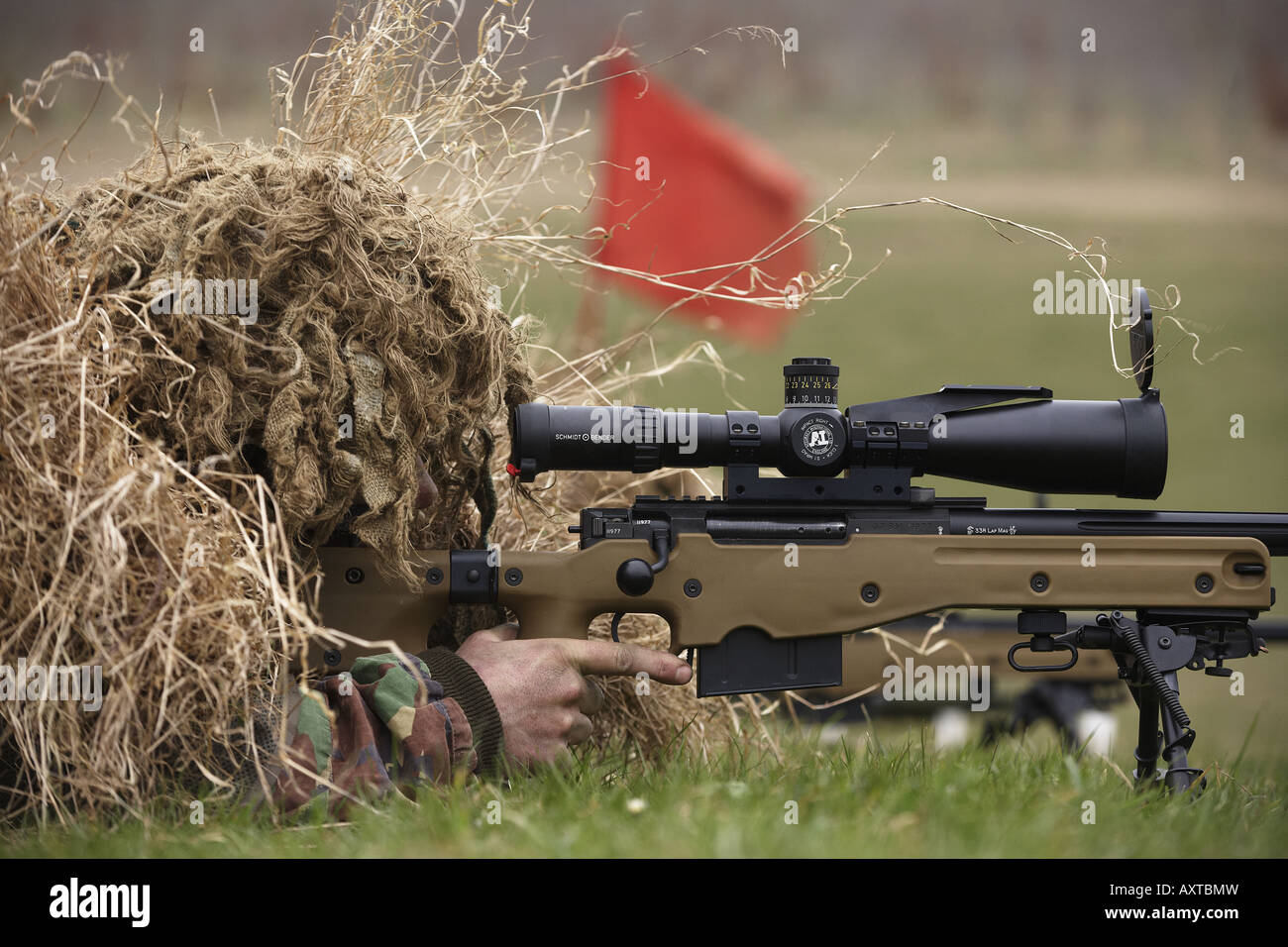 British Army Infantry soldiers demonstrate their newest L115A3 sniper rifle on firing ranges of the Support Weapon School UK Stock Photo