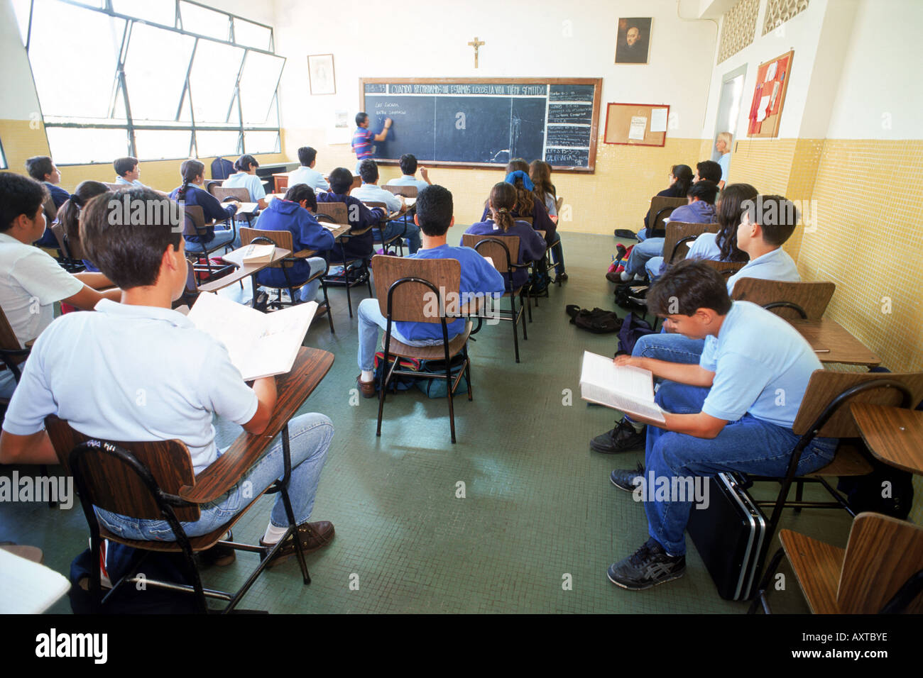 Elementary school classroom with teacher and students in Caracas Stock