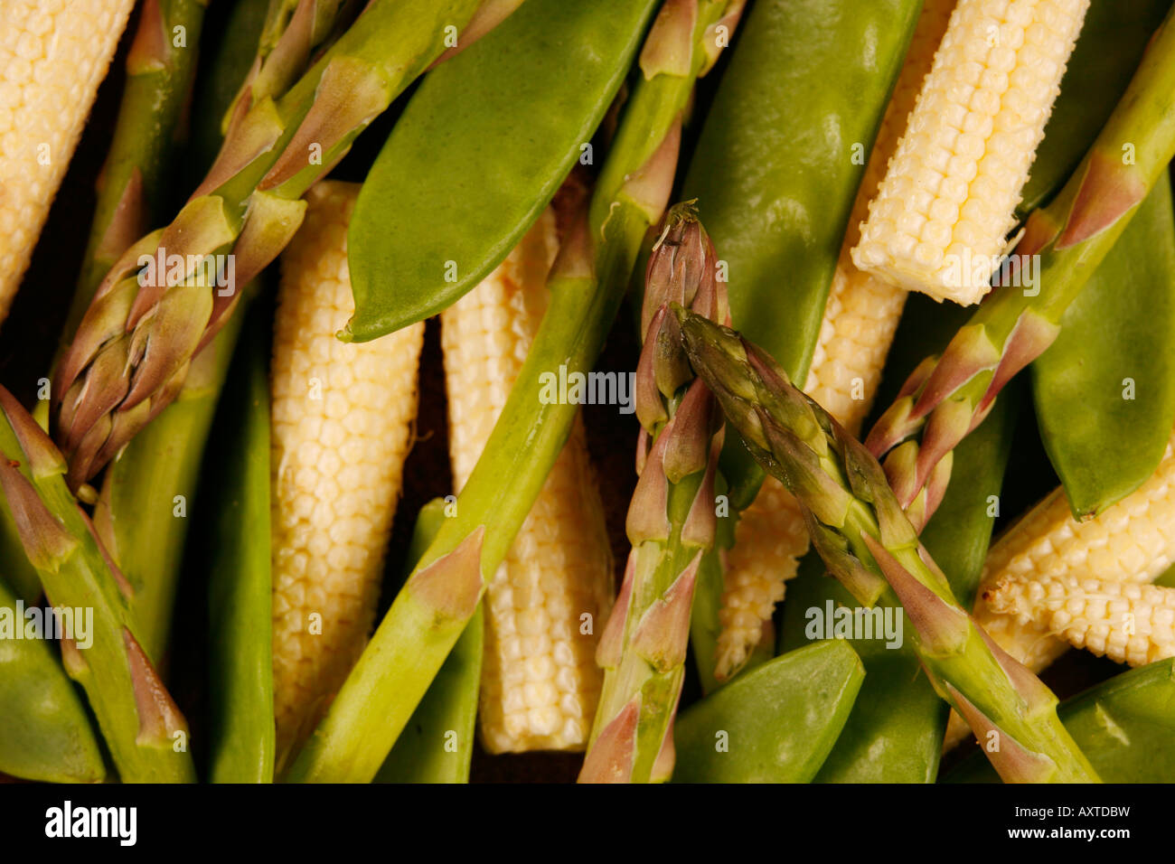 Baby corn, mange touts and asparagus Stock Photo Alamy