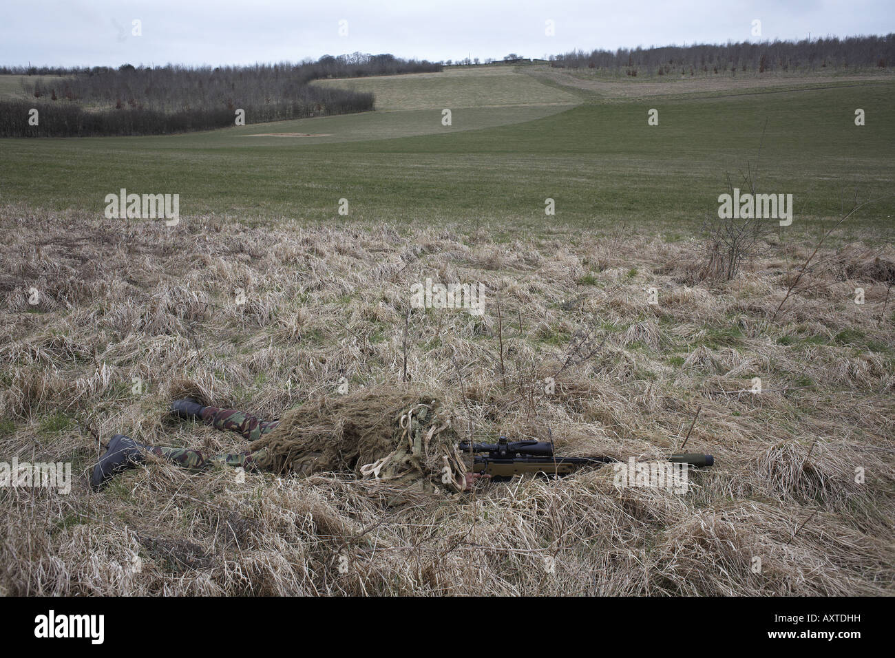 British Army Infantry soldiers demonstrate their newest L115A3 sniper rifle on firing ranges of the Support Weapon School UK Stock Photo