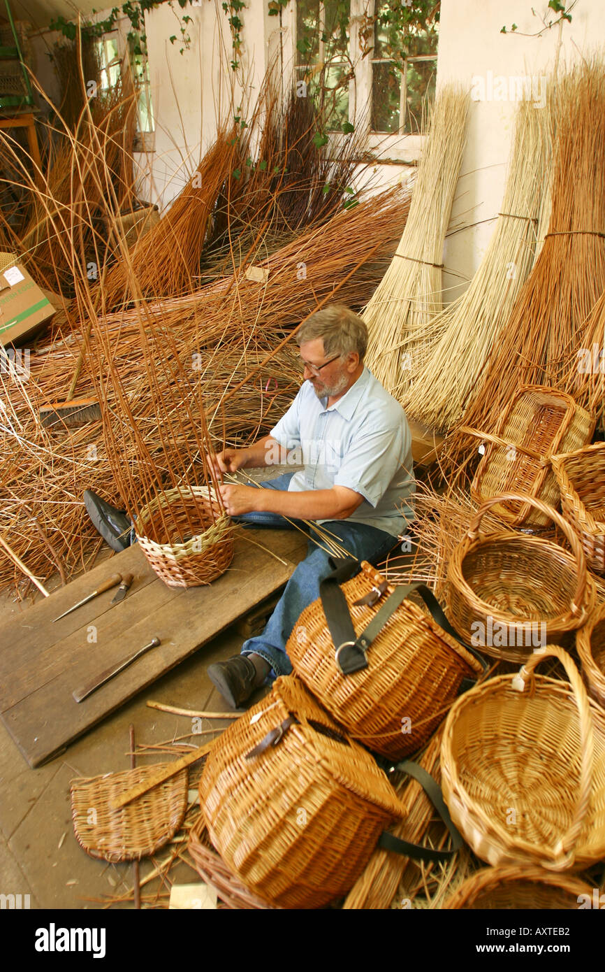 craftsman weaving a basket from willow Stock Photo Alamy