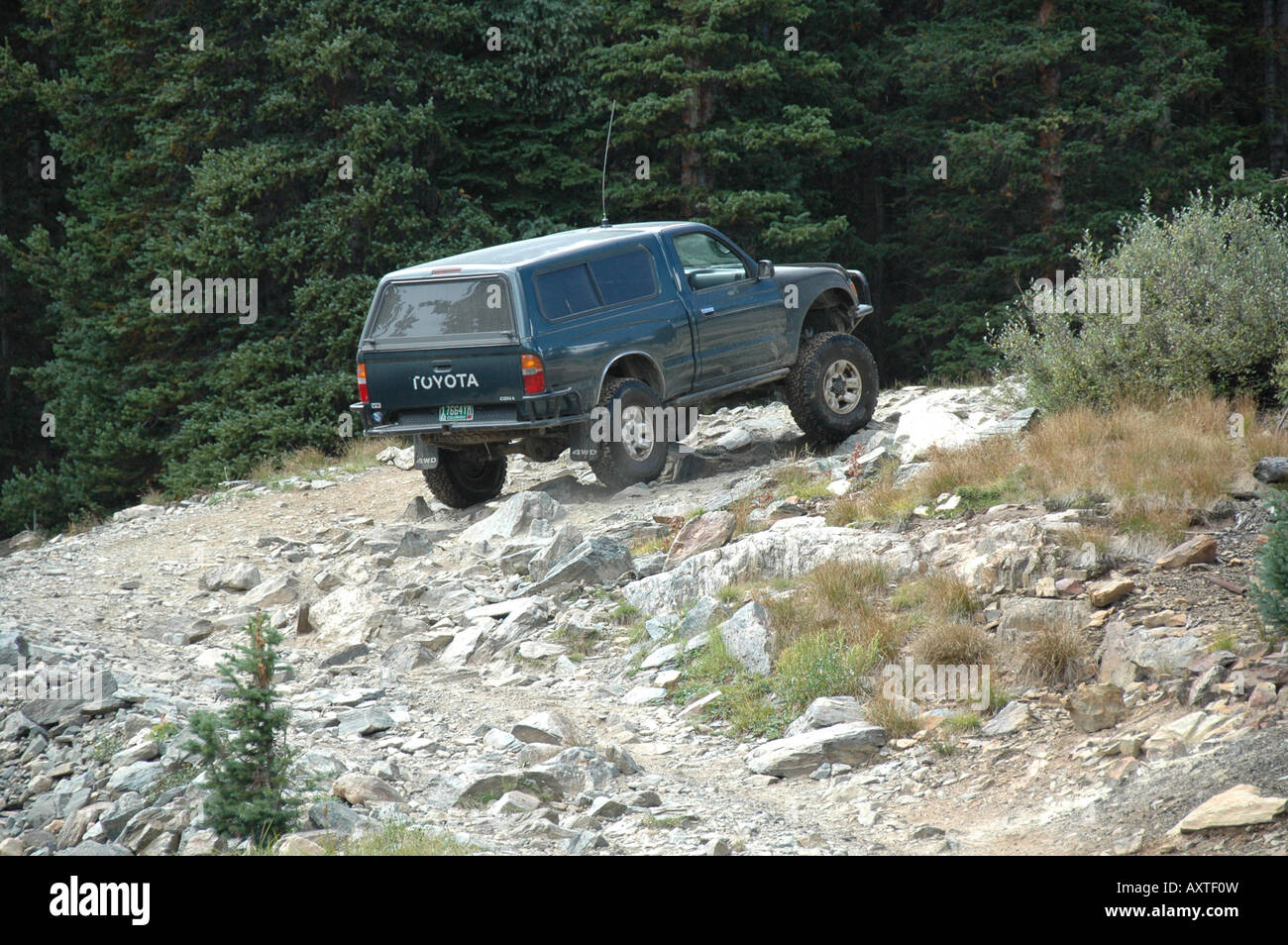 A 4WD tackles the track up to Holy Cross City Ghost Town, Eagle County, Colorado Stock Photo