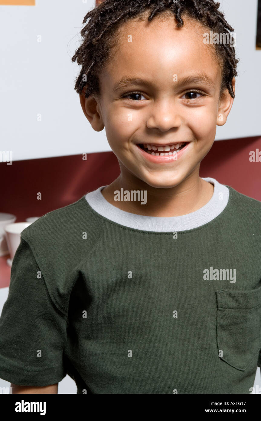 Portrait of a young boy smiling Stock Photo - Alamy