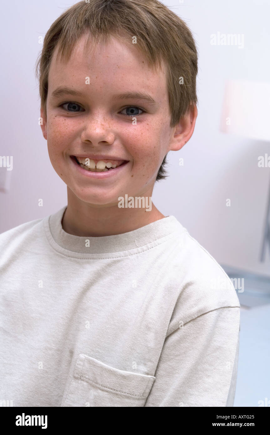 Portrait of a young boy smiling Stock Photo - Alamy