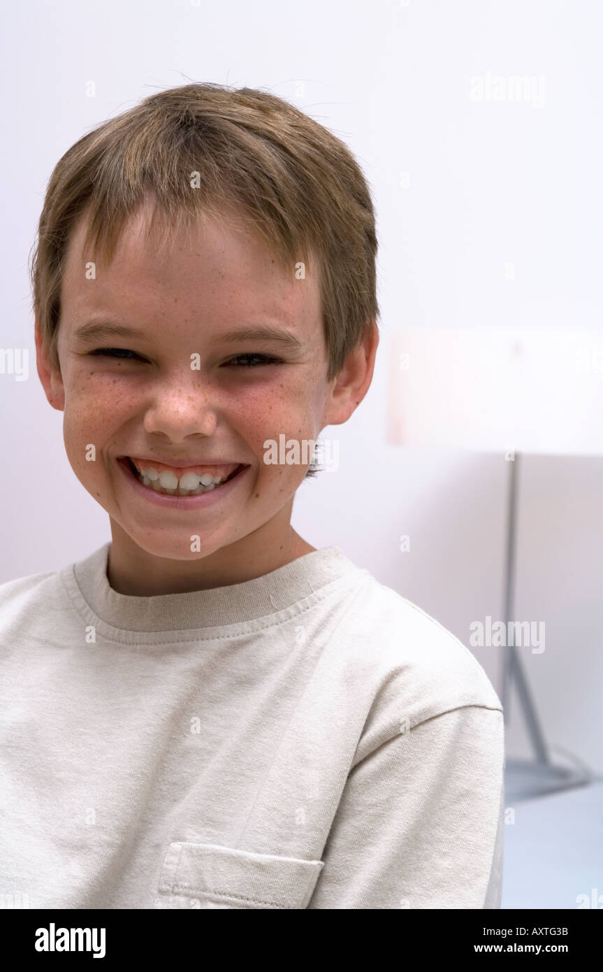 Portrait of a young boy smiling Stock Photo - Alamy