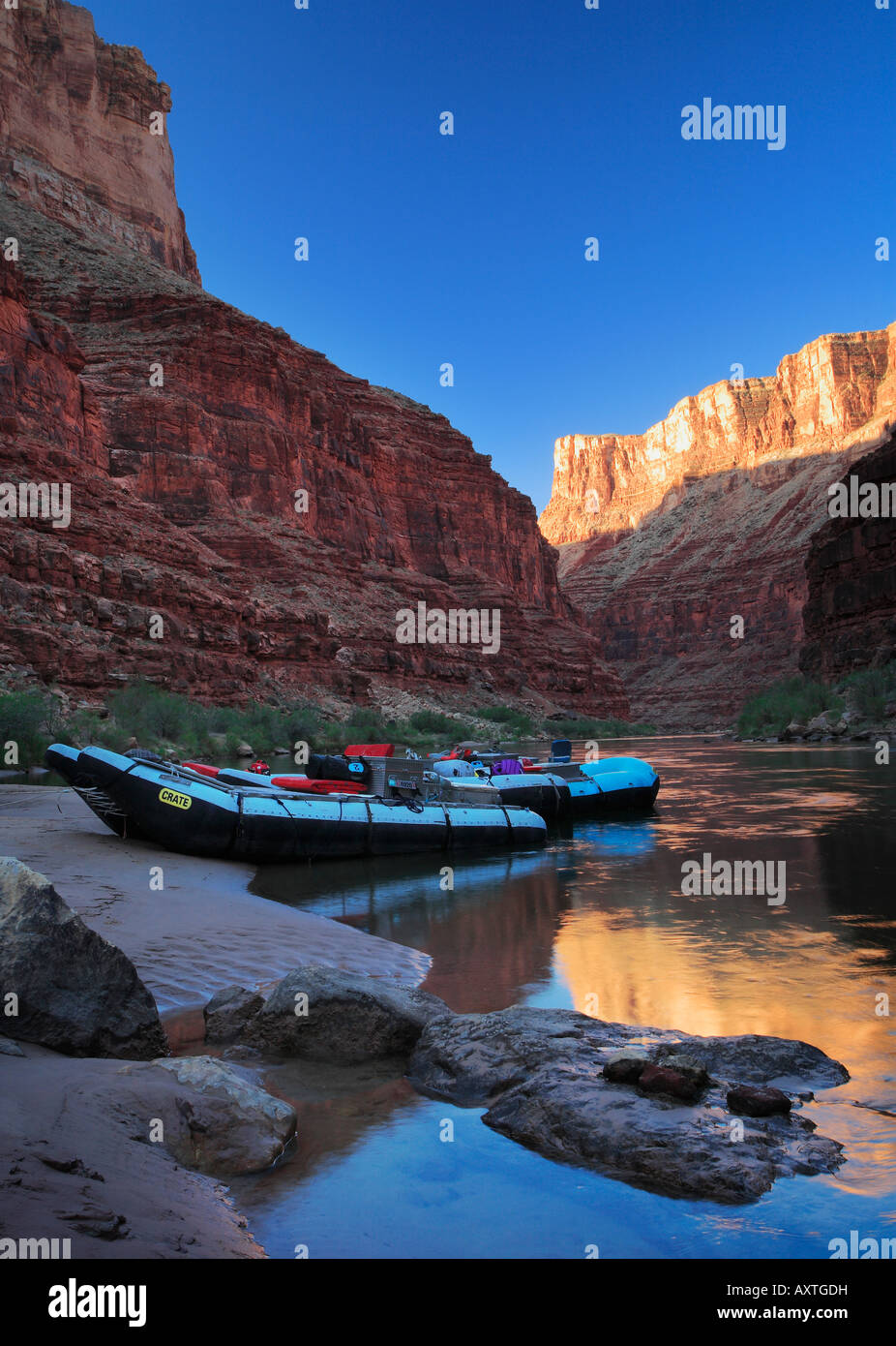 Rafts at dawn on the Colorado River in the interior of the Grand Canyon Stock Photo